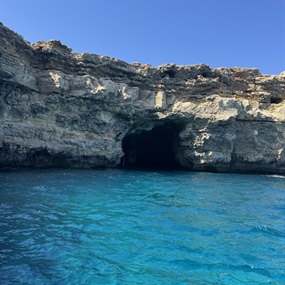the Santa Maria Caves (also known as Santa Marija Caves), situated on the north-eastern coast of Comino, a small island between mainland Malta and Gozo.