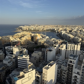 Aerial view captures the dense urban landscape of Saint Julian's, Malta