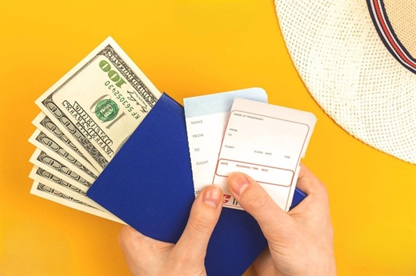 How do unmanaged travel programs create hidden financial leakage in organizations?