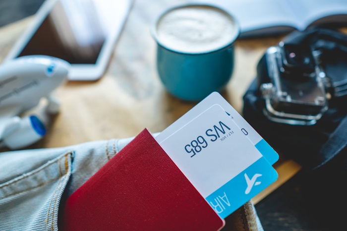 What role does procurement play in corporate travel management?