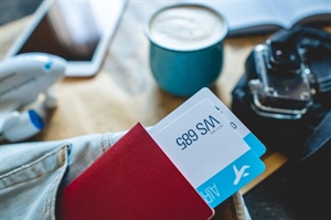 What role does procurement play in corporate travel management?