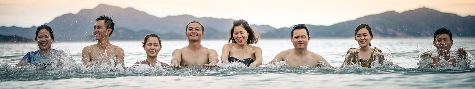 Group of people swimming in the ocean