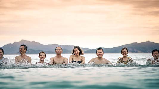 Friends Swimming in the ocean